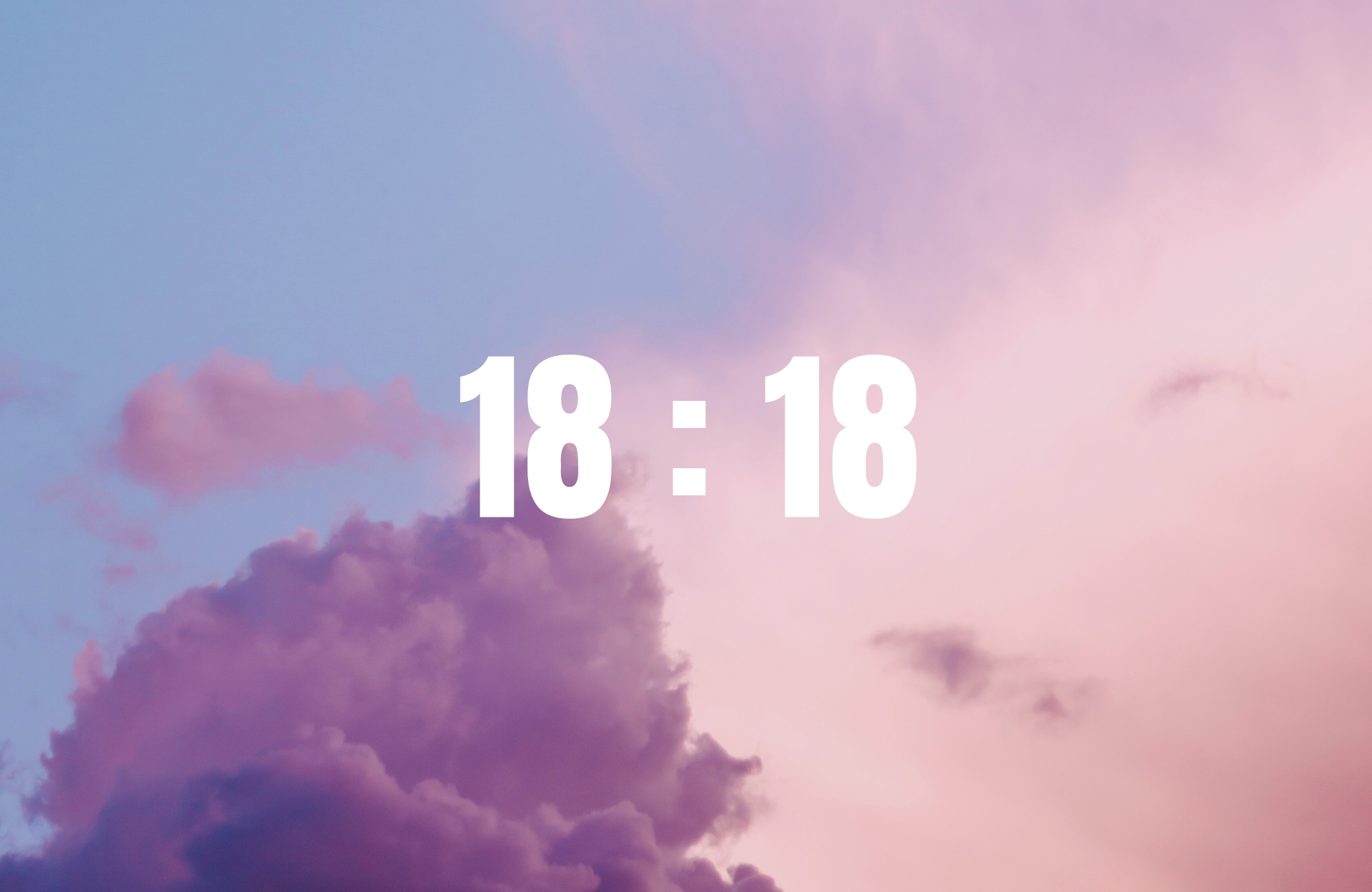 Horloge affichant 18h18 pour illustrer la signification d'une heure miroir